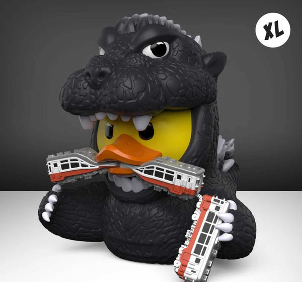 A cosplaying duck collectable as Godzilla